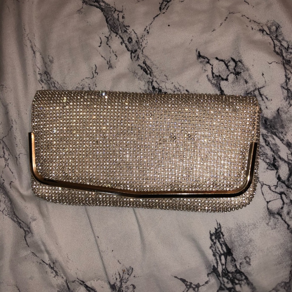 All over stone clutch